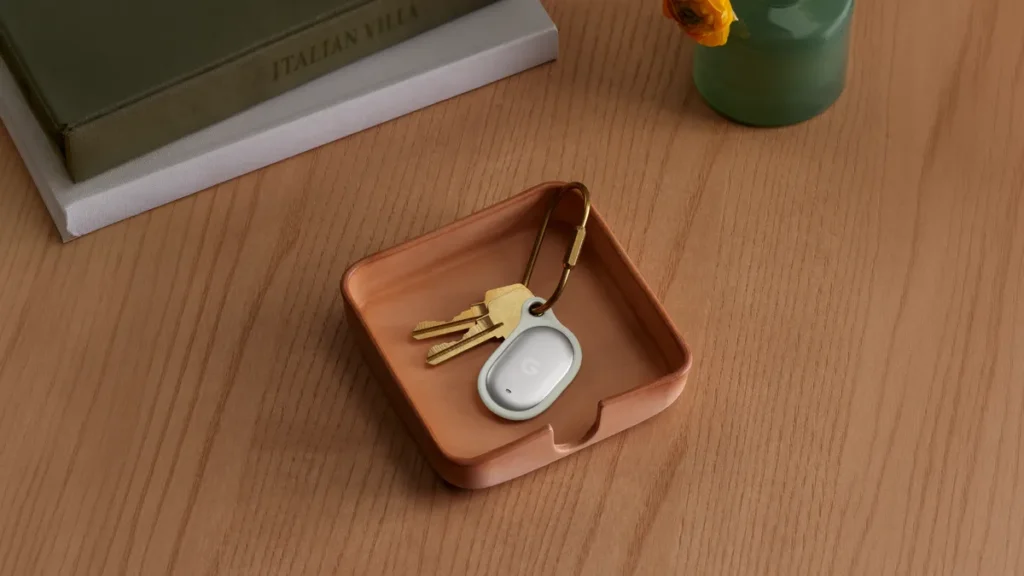 Google Pixel Tag attached to a keychain for tracking items with Find Hub